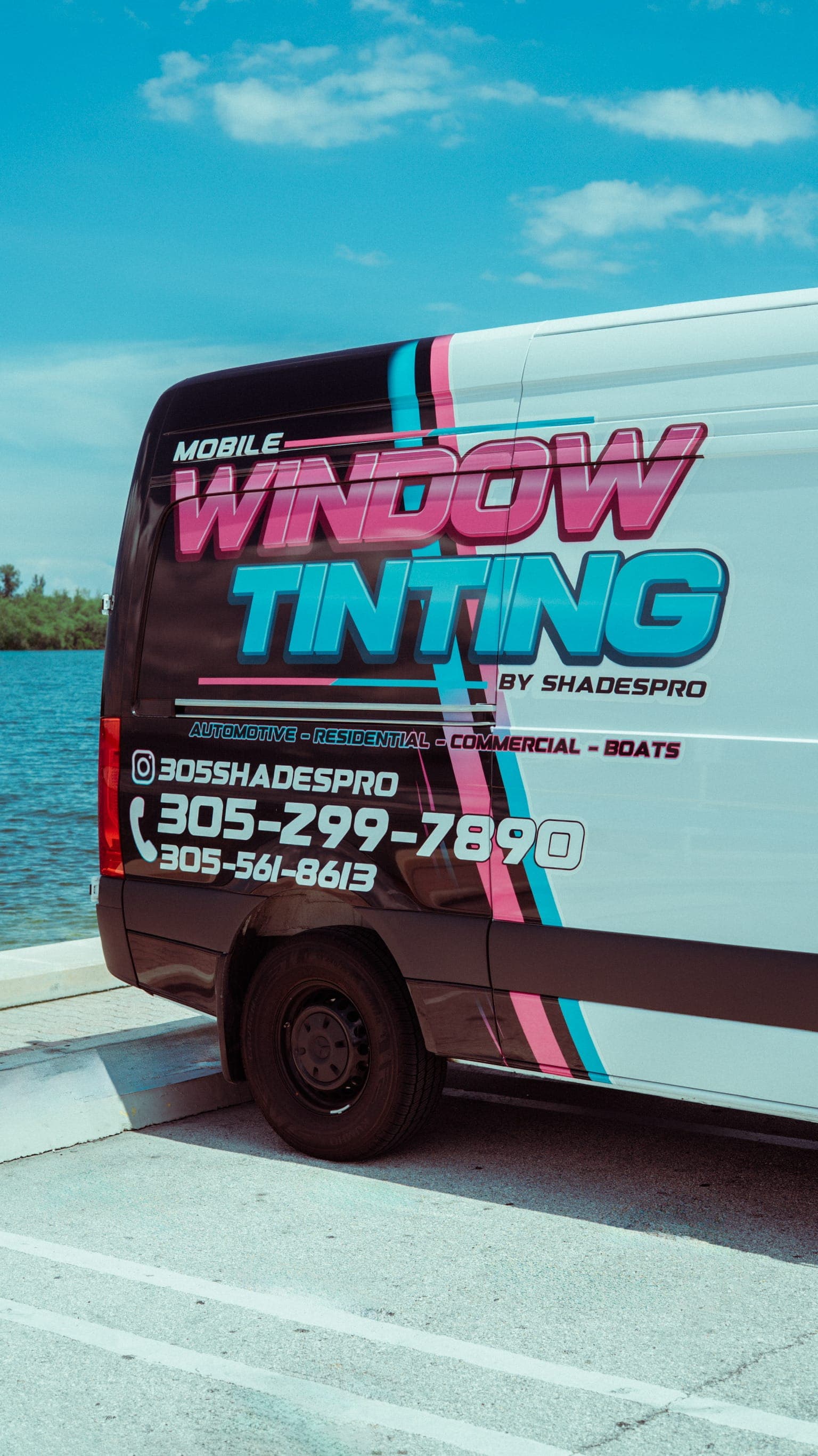 305 Shades Pro branded van parked at the Miami waterfront
